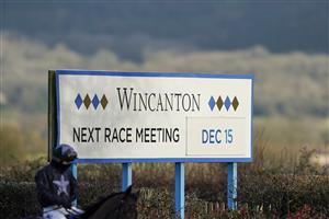 WINCANTON, ENGLAND - DECEMBER 15: A general view as a runner makes its way to the track for the first race of the day at Wincanton Racecourse on December 15, 2020 in Wincanton, England. Owners and a limited number of the public are allowed to attend the meeting due to the Coronavirus pandemic. (Photo by Alan Crowhurst/Getty Images)
