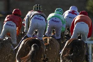 WINCANTON, ENGLAND - DECEMBER 15: A general view as runner take the bend during The Every Race Live On Racing TV Maiden Hurdle at Wincanton Racecourse on December 15, 2020 in Wincanton, England. Owners and a limited number of the public are allowed to attend the meeting due to the Coronavirus pandemic. (Photo by Alan Crowhurst/Getty Images)