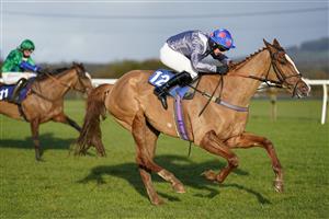 WINCANTON, ENGLAND - DECEMBER 15: Matt Griffiths riding Sizable Sam (silver) clear the last to win The Watch On Racing TV Novices' Hurdle at Wincanton Racecourse on December 15, 2020 in Wincanton, England. Owners and a limited number of the public are allowed to attend the meeting due to the Coronavirus pandemic. (Photo by Alan Crowhurst/Getty Images)