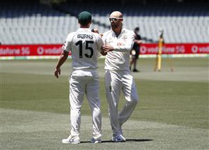 ADELAIDE, AUSTRALIA - DECEMBER 15: Nathan Lyon of Australia speaks to Joe Burns of Australia during an Australian Nets Session at Adelaide Oval on December 15, 2020 in Adelaide, Australia. (Photo by Ryan Pierse/Getty Images)