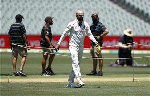 ADELAIDE, AUSTRALIA - DECEMBER 15: Nathan Lyon of Australia inspects the pitch during an Australian Nets Session at Adelaide Oval on December 15, 2020 in Adelaide, Australia. (Photo by Ryan Pierse/Getty Images)