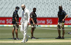 ADELAIDE, AUSTRALIA - DECEMBER 15: Nathan Lyon of Australia inspects the pitch during an Australian Nets Session at Adelaide Oval on December 15, 2020 in Adelaide, Australia. (Photo by Ryan Pierse/Getty Images)