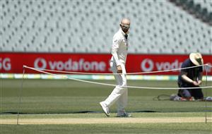 ADELAIDE, AUSTRALIA - DECEMBER 15: Nathan Lyon of Australia inspects the pitch during an Australian Nets Session at Adelaide Oval on December 15, 2020 in Adelaide, Australia. (Photo by Ryan Pierse/Getty Images)