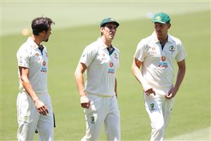 ADELAIDE, AUSTRALIA - DECEMBER 15: (L-R) Mitchell Starc of Australia, Pat Cummins of Australia and Josh Hazelwood of Australia chat during an Australian nets session at Adelaide Oval on December 15, 2020 in Adelaide, Australia. (Photo by Daniel Kalisz/Getty Images)