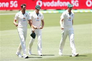ADELAIDE, AUSTRALIA - DECEMBER 15: (L-R) Mitchell Starc of Australia, Pat Cummins of Australia and Josh Hazelwood of Australia chat during an Australian nets session at Adelaide Oval on December 15, 2020 in Adelaide, Australia. (Photo by Daniel Kalisz/Getty Images)