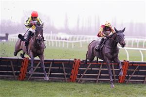 NEWBURY, ENGLAND - DECEMBER 16: Tom O'Brien riding French Paradoxe (R) clear the last to win The Every Race Live On Racing TV EBF Stallions 'National Hunt' Novices' Hurdle from Harry Skelton and Flash Collonges at Newbury Racecourse on December 16, 2020 in Newbury, England. Owners and a limited number of the public are allowed to attend the meeting due to the Coronavirus pandemic. (Photo by Alan Crowhurst/Getty Images)