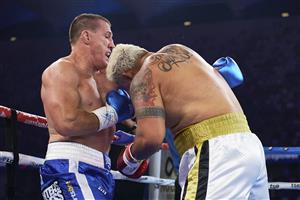 SYDNEY, AUSTRALIA - DECEMBER 16: Paul Gallen and Mark Hunt compete during the Main Event fight prior to the light-middleweight World Title elimination bout between Tim Tszyu and Bowyn Morgan at Bankwest Stadium on December 16, 2020 in Sydney, Australia. (Photo by Brett Hemmings/Getty Images)