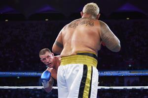 SYDNEY, AUSTRALIA - DECEMBER 16: Paul Gallen and Mark Hunt compete during the Main Event fight prior to the light-middleweight World Title elimination bout between Tim Tszyu and Bowyn Morgan at Bankwest Stadium on December 16, 2020 in Sydney, Australia. (Photo by Brett Hemmings/Getty Images)
