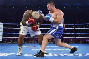 SYDNEY, AUSTRALIA - DECEMBER 16: Paul Gallen and Mark Hunt compete during the Main Event fight prior to the light-middleweight World Title elimination bout between Tim Tszyu and Bowyn Morgan at Bankwest Stadium on December 16, 2020 in Sydney, Australia. (Photo by Brett Hemmings/Getty Images)