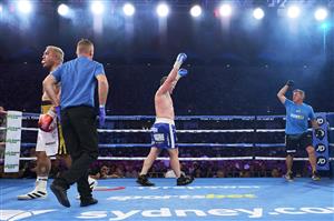 SYDNEY, AUSTRALIA - DECEMBER 16: Paul Gallen celebrates after the final round over Mark Hunt during the Main Event fight prior to the light-middleweight World Title elimination bout between Tim Tszyu and Bowyn Morgan at Bankwest Stadium on December 16, 2020 in Sydney, Australia. (Photo by Brett Hemmings/Getty Images)