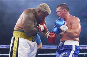 SYDNEY, AUSTRALIA - DECEMBER 16: Paul Gallen and Mark Hunt compete during the Main Event fight prior to the light-middleweight World Title elimination bout between Tim Tszyu and Bowyn Morgan at Bankwest Stadium on December 16, 2020 in Sydney, Australia. (Photo by Brett Hemmings/Getty Images)