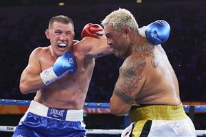 SYDNEY, AUSTRALIA - DECEMBER 16: Paul Gallen and Mark Hunt compete during the Main Event fight prior to the light-middleweight World Title elimination bout between Tim Tszyu and Bowyn Morgan at Bankwest Stadium on December 16, 2020 in Sydney, Australia. (Photo by Brett Hemmings/Getty Images)