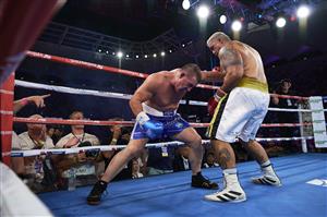 SYDNEY, AUSTRALIA - DECEMBER 16: Paul Gallen and Mark Hunt compete during the Main Event fight prior to the light-middleweight World Title elimination bout between Tim Tszyu and Bowyn Morgan at Bankwest Stadium on December 16, 2020 in Sydney, Australia. (Photo by Brett Hemmings/Getty Images)