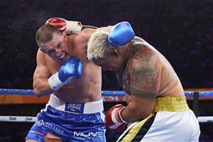 SYDNEY, AUSTRALIA - DECEMBER 16: Paul Gallen and Mark Hunt compete during the Main Event fight prior to the light-middleweight World Title elimination bout between Tim Tszyu and Bowyn Morgan at Bankwest Stadium on December 16, 2020 in Sydney, Australia. (Photo by Brett Hemmings/Getty Images)