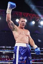 SYDNEY, AUSTRALIA - DECEMBER 16: Paul Gallen celebrates victory over Mark Hunt during the Main Event fight prior to the light-middleweight World Title elimination bout between Tim Tszyu and Bowyn Morgan at Bankwest Stadium on December 16, 2020 in Sydney, Australia. (Photo by Brett Hemmings/Getty Images)