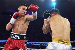 SYDNEY, AUSTRALIA - DECEMBER 16: Tim Tszyu and Bowyn Morgan compete during the light-middleweight World Title elimination bout between Tim Tszyu and Bowyn Morgan at Bankwest Stadium on December 16, 2020 in Sydney, Australia. (Photo by Brett Hemmings/Getty Images)