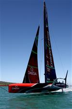 AUCKLAND, NEW ZEALAND - DECEMBER 17: Emirates Team New Zealand skippered by Peter Burling lead Luna Rossa Prada Pirelli Team, skippered by Max Sirena across the finish line in the first race of the America's Cup World Series on Auckland Harbour on December 17, 2020 in Auckland, New Zealand. (Photo by Phil Walter/Getty Images)