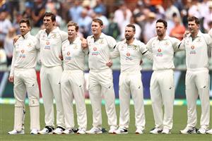 ADELAIDE, AUSTRALIA - DECEMBER 17: Members of the Australian team stand during the signing of the national anthem during day one of the First Test match between Australia and India at Adelaide Oval on December 17, 2020 in Adelaide, Australia. (Photo by Cameron Spencer/Getty Images)