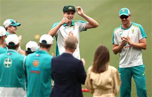 ADELAIDE, AUSTRALIA - DECEMBER 17: Cameron Green of Australia receives his Baggy Green Cap during day one of the First Test match between Australia and India at Adelaide Oval on December 17, 2020 in Adelaide, Australia. (Photo by Ryan Pierse/Getty Images)