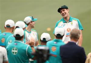 ADELAIDE, AUSTRALIA - DECEMBER 17: Cameron Green of Australia receives his Baggy Green Cap during day one of the First Test match between Australia and India at Adelaide Oval on December 17, 2020 in Adelaide, Australia. (Photo by Ryan Pierse/Getty Images)