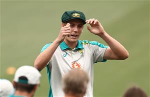 ADELAIDE, AUSTRALIA - DECEMBER 17: Cameron Green of Australia receives his Baggy Green Cap during day one of the First Test match between Australia and India at Adelaide Oval on December 17, 2020 in Adelaide, Australia. (Photo by Ryan Pierse/Getty Images)