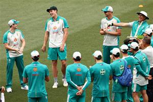 ADELAIDE, AUSTRALIA - DECEMBER 17: Cameron Green of Australia is presented is Test Cap on debut day one of the First Test match between Australia and India at Adelaide Oval on December 17, 2020 in Adelaide, Australia. (Photo by Cameron Spencer/Getty Images)