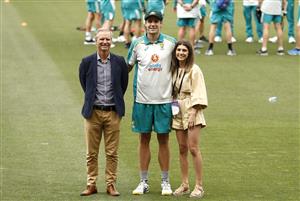 ADELAIDE, AUSTRALIA - DECEMBER 17: Cameron Green of Australia poses with his father Gary Green and girlfriend Emily Redwood after he received his Baggy Green Cap during day one of the First Test match between Australia and India at Adelaide Oval on December 17, 2020 in Adelaide, Australia. (Photo by Ryan Pierse/Getty Images)