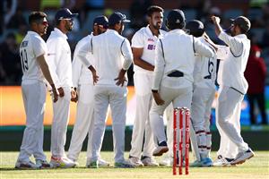 ADELAIDE, AUSTRALIA - DECEMBER 18: Ravi Ashwin of India celebrates with his team after taking the wicket of Travis Head of Australia during day two of the First Test match between Australia and India at Adelaide Oval on December 18, 2020 in Adelaide, Australia. (Photo by Ryan Pierse/Getty Images)