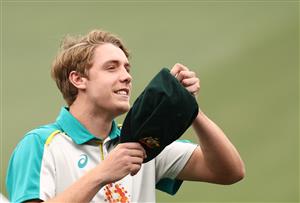 ADELAIDE, AUSTRALIA - DECEMBER 17: Cameron Green of Australia receives his Baggy Green Cap during day one of the First Test match between Australia and India at Adelaide Oval on December 17, 2020 in Adelaide, Australia. (Photo by Ryan Pierse/Getty Images)