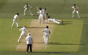 ADELAIDE, AUSTRALIA - DECEMBER 17: Matthew Wade of Australia attempts to catch Cheteshwar Pujara of India during day one of the First Test match between Australia and India at Adelaide Oval on December 17, 2020 in Adelaide, Australia. (Photo by Ryan Pierse/Getty Images)