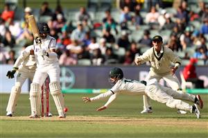 ADELAIDE, AUSTRALIA - DECEMBER 17: Matthew Wade of Australia attempts to catch Cheteshwar Pujara of India during day one of the First Test match between Australia and India at Adelaide Oval on December 17, 2020 in Adelaide, Australia. (Photo by Ryan Pierse/Getty Images)