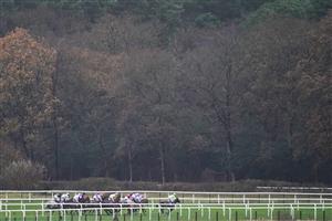 ASCOT, ENGLAND - DECEMBER 18: A general view as runners in The ITV7 100k Jackpot On Boxing Day Conditional Jockeys' Handicap Hurdle take the bottom bend at Ascot Racecourse on December 18, 2020 in Ascot, England. Owners are allowed to attend if they have a runner at the meeting otherwise racing remains behind closed doors to the public due to the Coronavirus pandemic. (Photo by Alan Crowhurst/Getty Images)