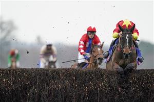 ASCOT, ENGLAND - DECEMBER 18: Charlie Deutsch riding Enzo d'Airy clear the last to win The Sky Bet Extra Places Every Day Novices' Limited Handicap Chase at Ascot Racecourse on December 18, 2020 in Ascot, England. Owners are allowed to attend if they have a runner at the meeting otherwise racing remains behind closed doors to the public due to the Coronavirus pandemic. (Photo by Alan Crowhurst/Getty Images)