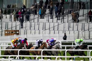 ASCOT, ENGLAND - DECEMBER 18: A general view as runners pass the grandstands with only owners and trainers in attendance in The ITV7 100k Jackpot On Boxing Day Conditional Jockeys' Handicap Hurdle at Ascot Racecourse on December 18, 2020 in Ascot, England. Owners are allowed to attend if they have a runner at the meeting otherwise racing remains behind closed doors to the public due to the Coronavirus pandemic. (Photo by Alan Crowhurst/Getty Images)