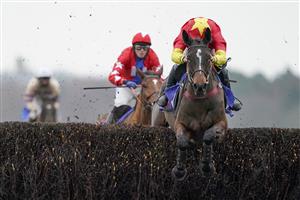 ASCOT, ENGLAND - DECEMBER 18: Charlie Deutsch riding Enzo d'Airy clear the last to win The Sky Bet Extra Places Every Day Novices' Limited Handicap Chase at Ascot Racecourse on December 18, 2020 in Ascot, England. Owners are allowed to attend if they have a runner at the meeting otherwise racing remains behind closed doors to the public due to the Coronavirus pandemic. (Photo by Alan Crowhurst/Getty Images)