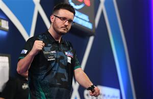 LONDON, ENGLAND - DECEMBER 18: Adam Hunt of England reacts during his second round match against Jamie Hughes of England during day four of the PDC William Hill World Darts Championship at Alexandra Palace on December 18, 2020 in London, England. (Photo by Luke Walker/Getty Images)