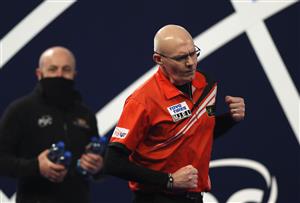 LONDON, ENGLAND - DECEMBER 18: Mickey Mansell of Northern Ireland reacts during his first round match against Haupai Puha of New Zealand during day four of the PDC William Hill World Darts Championship at Alexandra Palace on December 18, 2020 in London, England. (Photo by Luke Walker/Getty Images)