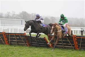 ASCOT, ENGLAND - DECEMBER 18: Harry Skelton riding My Drogo (L) clear the last to win The Sky Bet Supreme Trial Novices' Hurdle from Richard Johnson and Llandinabo Lad (R) at Ascot Racecourse on December 18, 2020 in Ascot, England. Owners are allowed to attend if they have a runner at the meeting otherwise racing remains behind closed doors to the public due to the Coronavirus pandemic. (Photo by Alan Crowhurst/Getty Images)