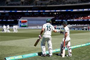 ADELAIDE, AUSTRALIA - DECEMBER 18: Joe Burns of Australia and Matthew Wade of Australia walk out to bat during day two of the First Test match between Australia and India at Adelaide Oval on December 18, 2020 in Adelaide, Australia. (Photo by Ryan Pierse/Getty Images)