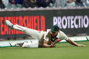 ADELAIDE, AUSTRALIA - DECEMBER 17: Josh Hazlewood of Australia fields the ball stopping a boundary during day one of the First Test match between Australia and India at Adelaide Oval on December 17, 2020 in Adelaide, Australia. (Photo by Cameron Spencer/Getty Images)