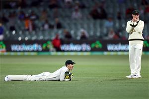 ADELAIDE, AUSTRALIA - DECEMBER 18: Tim Paine and Marnus Labuschagne of Australia look dejected after Paine dropped Mayank Agarwal of India during day two of the First Test match between Australia and India at Adelaide Oval on December 18, 2020 in Adelaide, Australia. (Photo by Ryan Pierse/Getty Images)