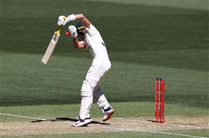 ADELAIDE, AUSTRALIA - DECEMBER 18: Marnus Labuschagne of Australia is struck by the ball from a delivery by Mohammed Shami of India during day two of the First Test match between Australia and India at Adelaide Oval on December 18, 2020 in Adelaide, Australia. (Photo by Ryan Pierse/Getty Images)