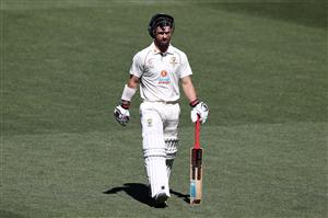 ADELAIDE, AUSTRALIA - DECEMBER 18: Matthew Wade of Australia leaves the field after being dismissed by Jasprit Bumrah of India during day two of the First Test match between Australia and India at Adelaide Oval on December 18, 2020 in Adelaide, Australia. (Photo by Ryan Pierse/Getty Images)
