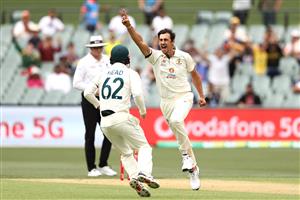 ADELAIDE, AUSTRALIA - DECEMBER 17: Mitchell Starc of Australia celebrates after taking the wicket of Prithvi Shaw of India for a duck during day one of the First Test match between Australia and India at Adelaide Oval on December 17, 2020 in Adelaide, Australia. (Photo by Ryan Pierse/Getty Images)