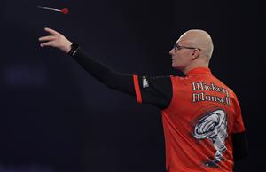 LONDON, ENGLAND - DECEMBER 18: Mickey Mansell of Northern Ireland in action during his first round match against Haupai Puha of New Zealand during day four of the PDC William Hill World Darts Championship at Alexandra Palace on December 18, 2020 in London, England. (Photo by Luke Walker/Getty Images)
