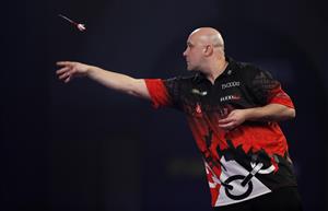 LONDON, ENGLAND - DECEMBER 18: Jamie Hughes of England in action during his second round match against Adam Hunt of England during day four of the PDC William Hill World Darts Championship at Alexandra Palace on December 18, 2020 in London, England. (Photo by Luke Walker/Getty Images)