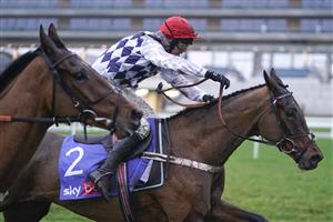 ASCOT, ENGLAND - DECEMBER 18: Nico de Boinville riding Allart (R) clear the last to win The Sky Bet Noel Novices' Chase from Robbie Power and Fiddlerontheroof (L) at Ascot Racecourse on December 18, 2020 in Ascot, England. Owners are allowed to attend if they have a runner at the meeting otherwise racing remains behind closed doors to the public due to the Coronavirus pandemic. (Photo by Alan Crowhurst/Getty Images)