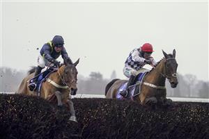ASCOT, ENGLAND - DECEMBER 18: Nico de Boinville riding Allart (R) clear the last to win The Sky Bet Noel Novices' Chase from Robbie Power and Fiddlerontheroof (L) at Ascot Racecourse on December 18, 2020 in Ascot, England. Owners are allowed to attend if they have a runner at the meeting otherwise racing remains behind closed doors to the public due to the Coronavirus pandemic. (Photo by Alan Crowhurst/Getty Images)