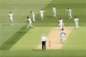 ADELAIDE, AUSTRALIA - DECEMBER 17: Pat Cummins of Australia celebrates dismissing Mayank Agarwal of India during day one of the First Test match between Australia and India at Adelaide Oval on December 17, 2020 in Adelaide, Australia. (Photo by Cameron Spencer/Getty Images)