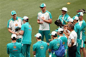 ADELAIDE, AUSTRALIA - DECEMBER 17: Cameron Green of Australia is presented is Test Cap on debut during by Pat Cummins of Australia day one of the First Test match between Australia and India at Adelaide Oval on December 17, 2020 in Adelaide, Australia. (Photo by Cameron Spencer/Getty Images)
